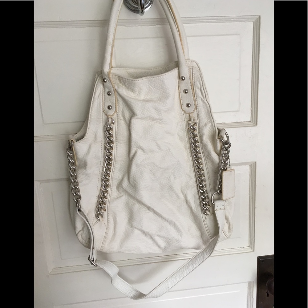 Carlos Santana white bag